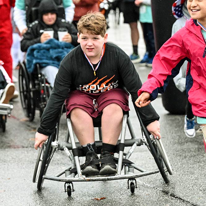 boy in racing wheelchair